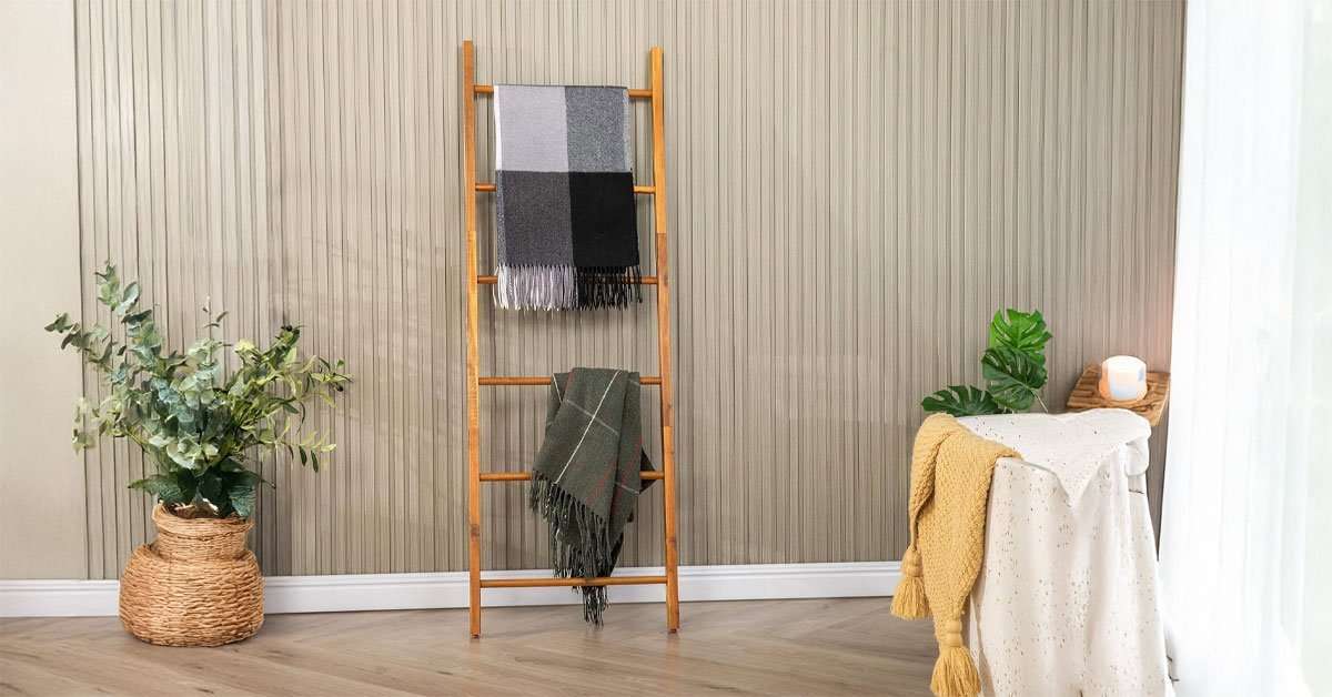 Acacia Wood Blanket Ladder 6-Tier 3 Blanket ladder in a bedroom with multiple throws and blankets on each tier