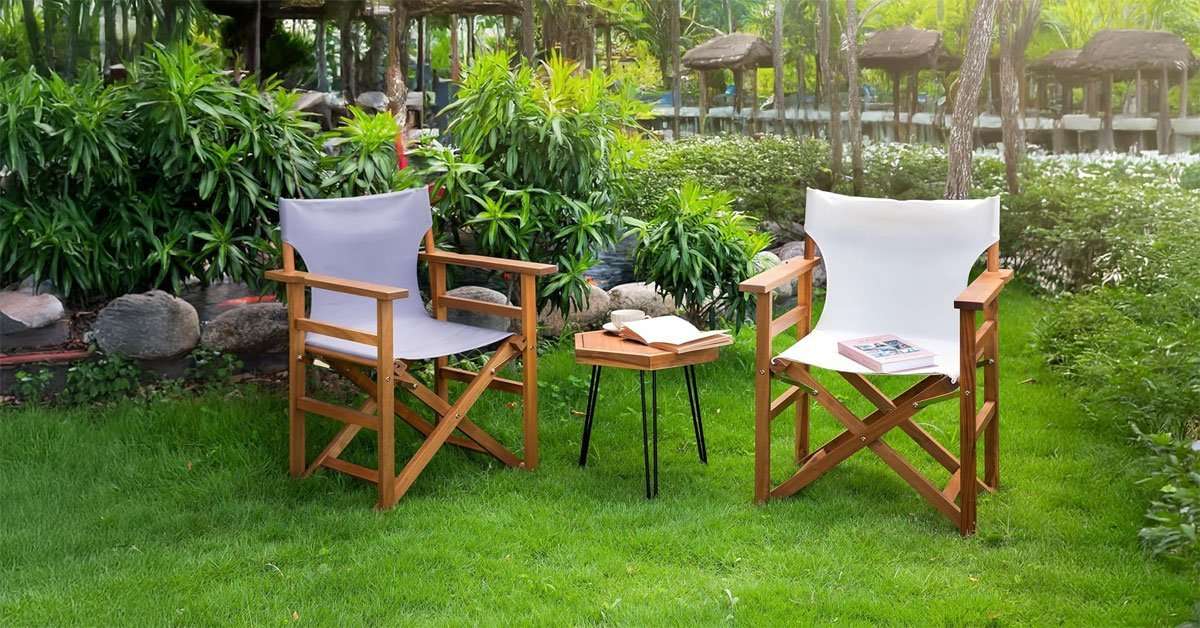 Acacia Wood Director Chair for Outdoor & Indoor Use 1 Solid acacia wood director chair with X-frame design set up outdoors in a garden
