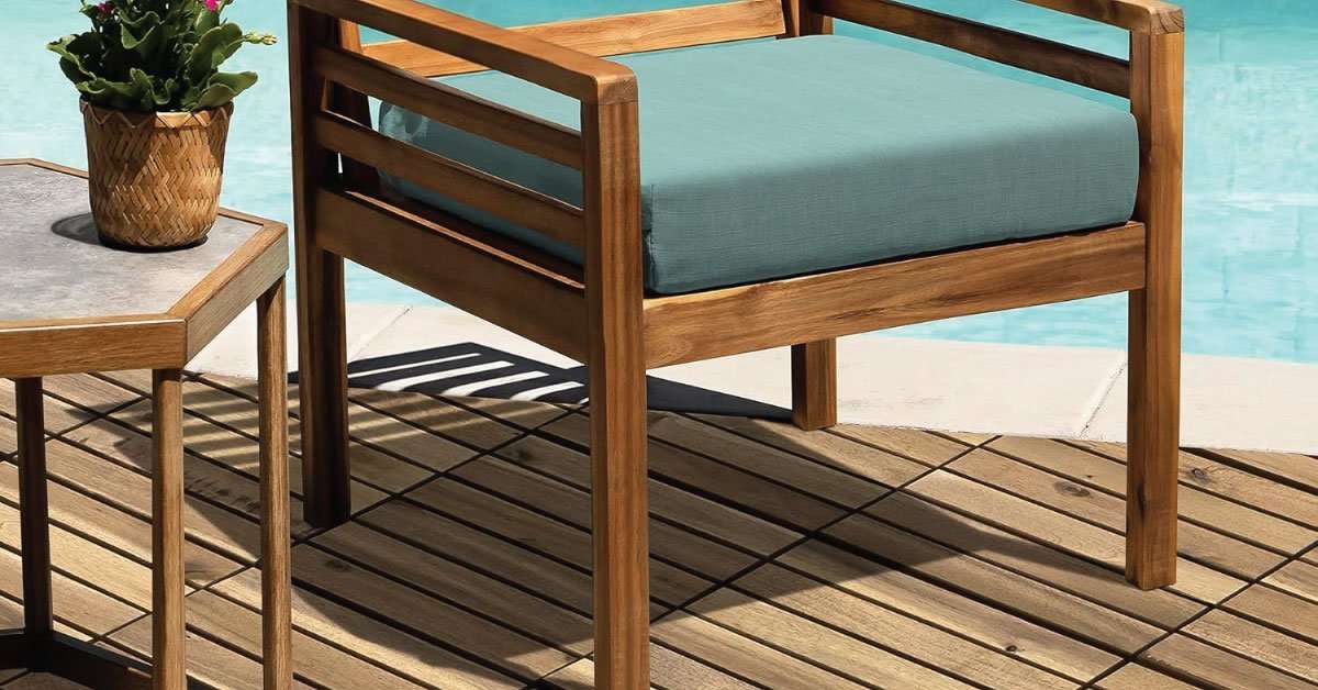 6-slat acacia wood deck tiles installed on an outdoor patio showing wide plank pattern