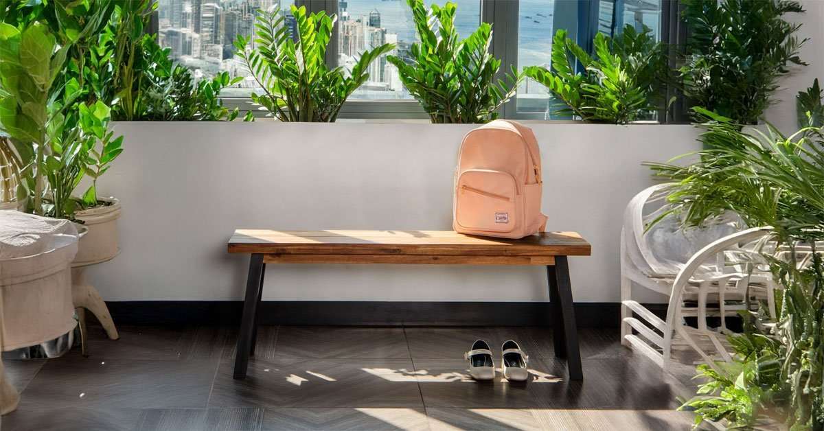 Solid Acacia Wood Bench for Entryway & Living Room 2 Acacia wood bench used as entryway seating with shoes underneath