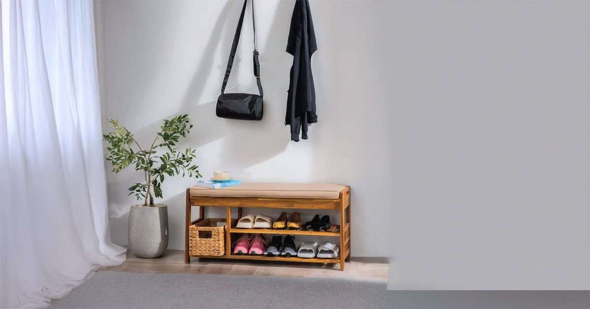 Wooden entryway bench detail showing shoe storage tier and solid wood seat surface