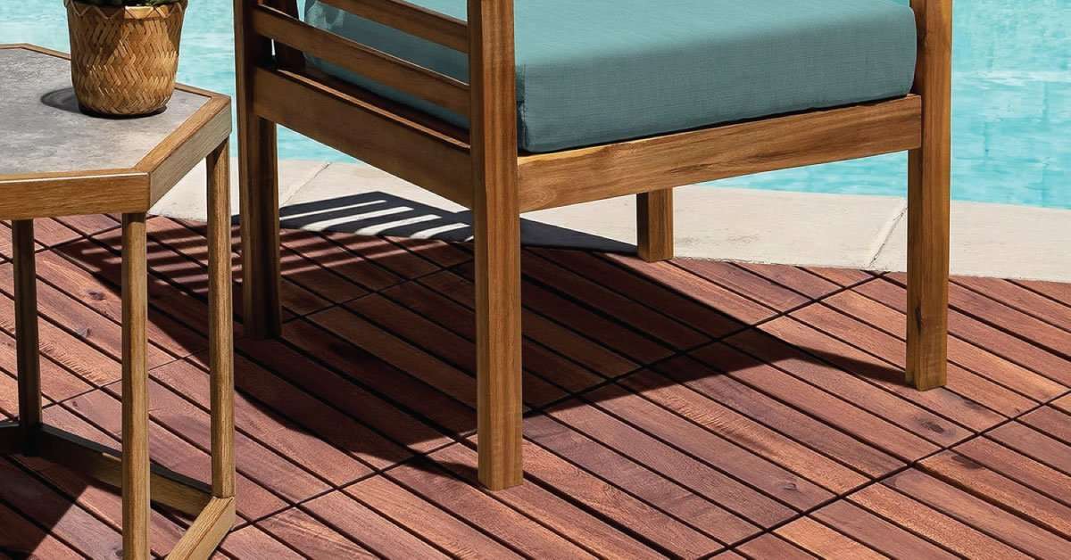 27-piece 6-slat acacia deck tile set covering a full balcony floor area