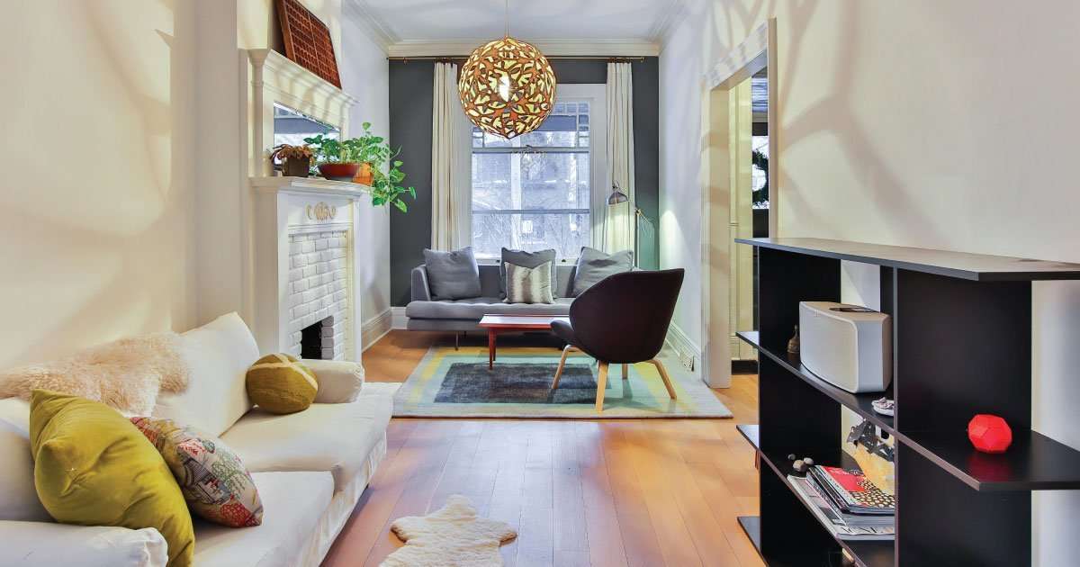 wood color interior design with warm dark wood tones and brass accents