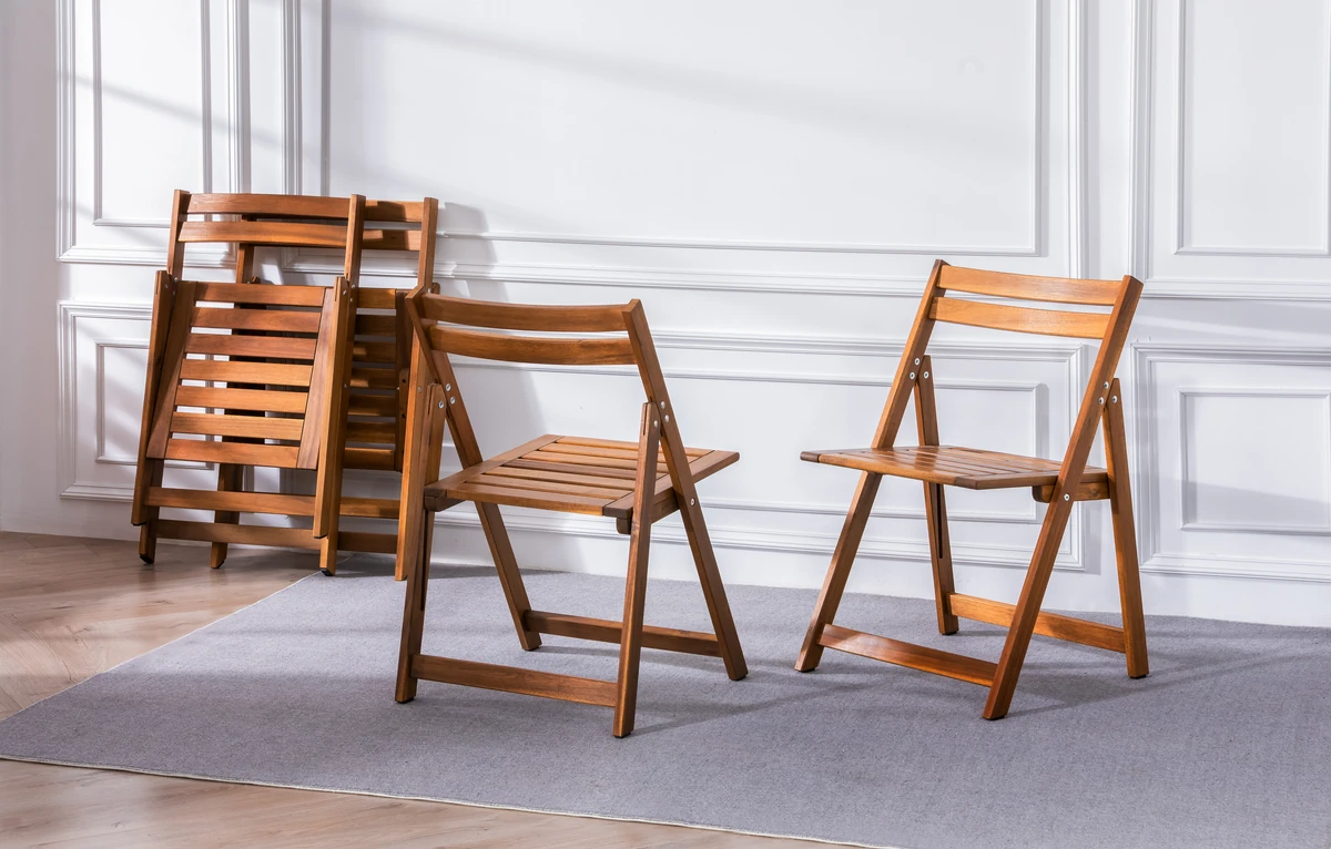 folding acacia wood chairs stored compactly beside open chairs