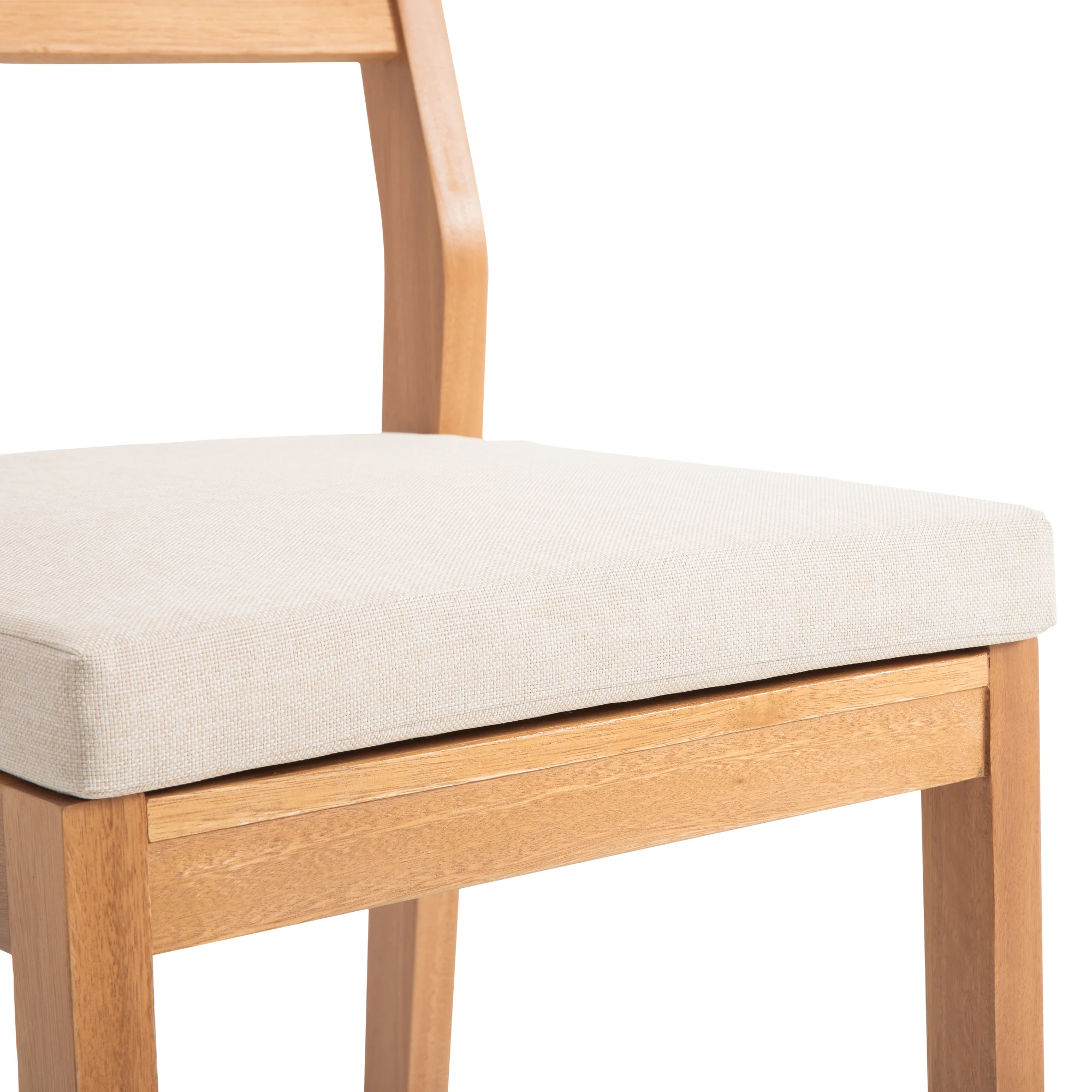 Seat frame detail on a solid wood patio dining side chair