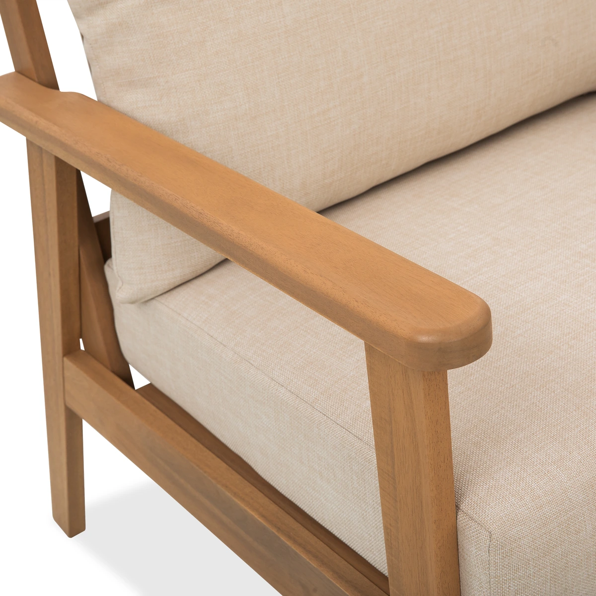 Close-up of wood lounge chair armrest and cushion