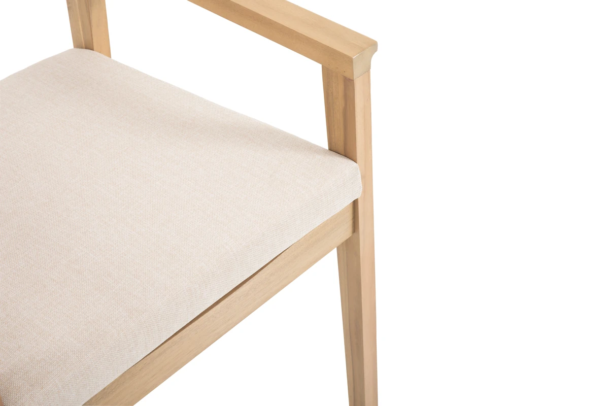 Cream seat cushion and acacia wood armrest detail