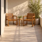 Best outdoor chairs for small patio inspiration with two acacia armchairs and a clear route on a compact balcony.